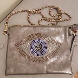 Cross over evil eye leather bag
